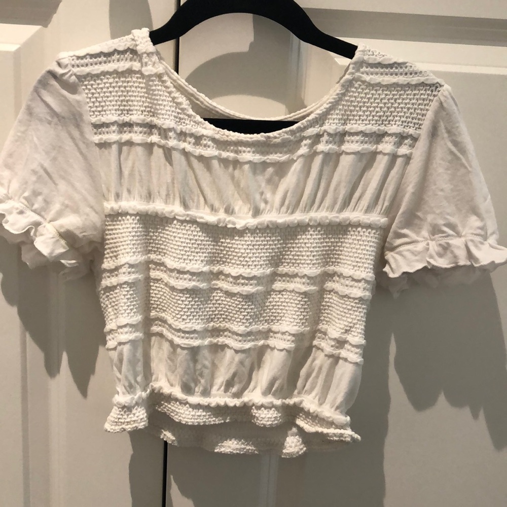 White ruffle top